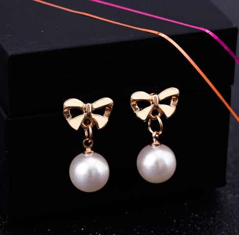 Heart Shaped Zircon & Bow Pearl Earrings