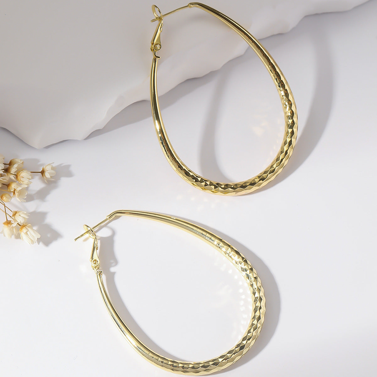 Golden Egg-Shaped Earrings
