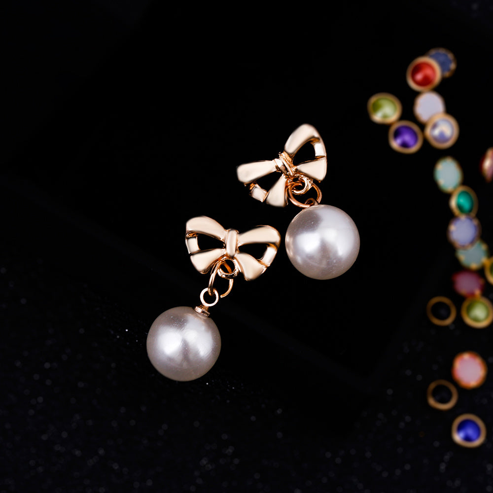 Heart Shaped Zircon & Bow Pearl Earrings