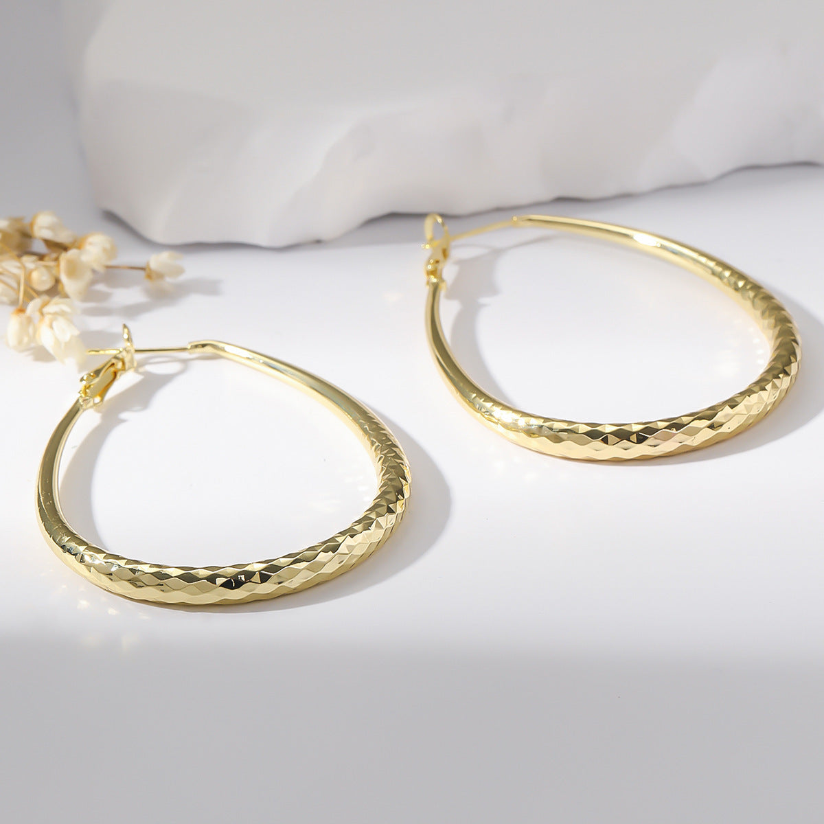 Golden Egg-Shaped Earrings