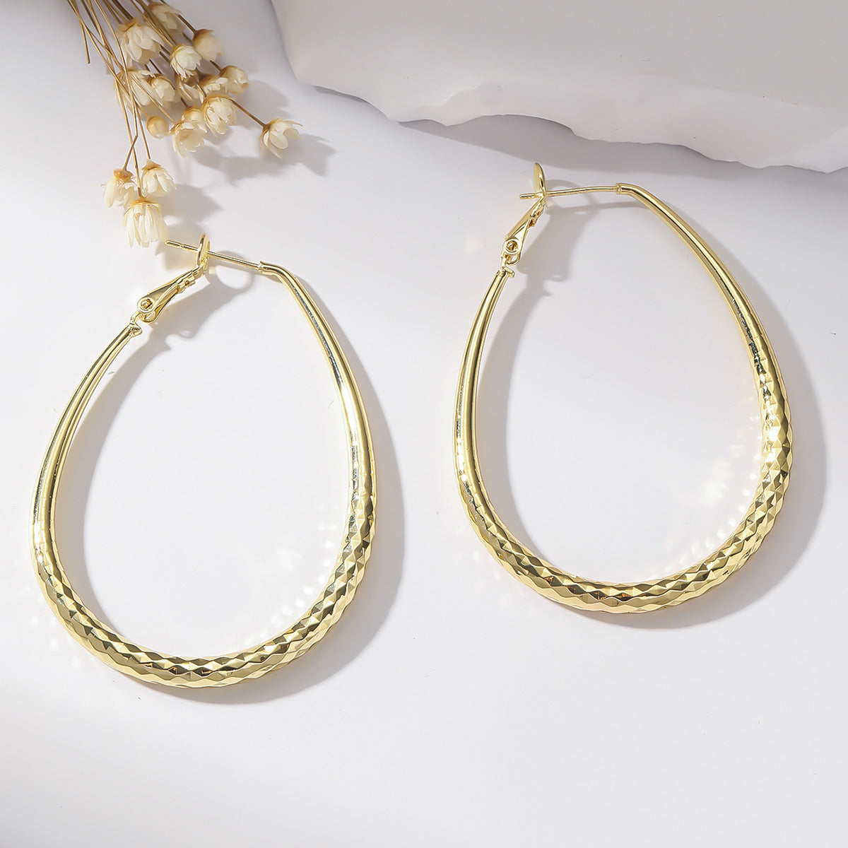 Golden Egg-Shaped Earrings